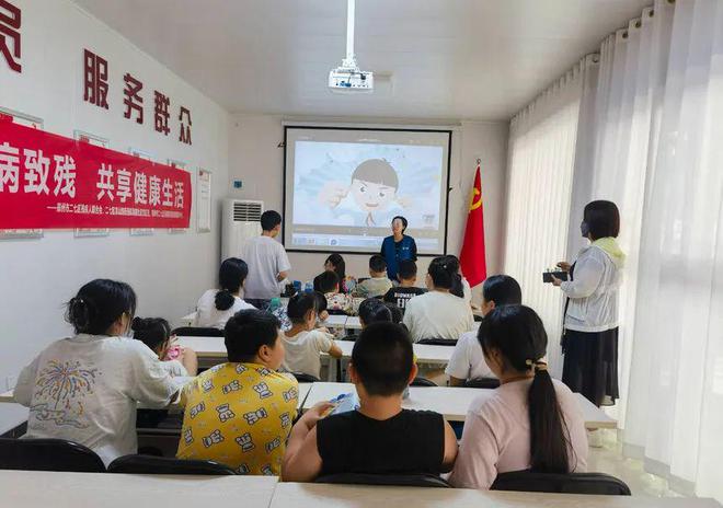 Pg电子平台：嵩山路街道航海路社区开展“预防疾病致残共享健康生活”残疾预防日宣传活动河南基层社区融媒中心